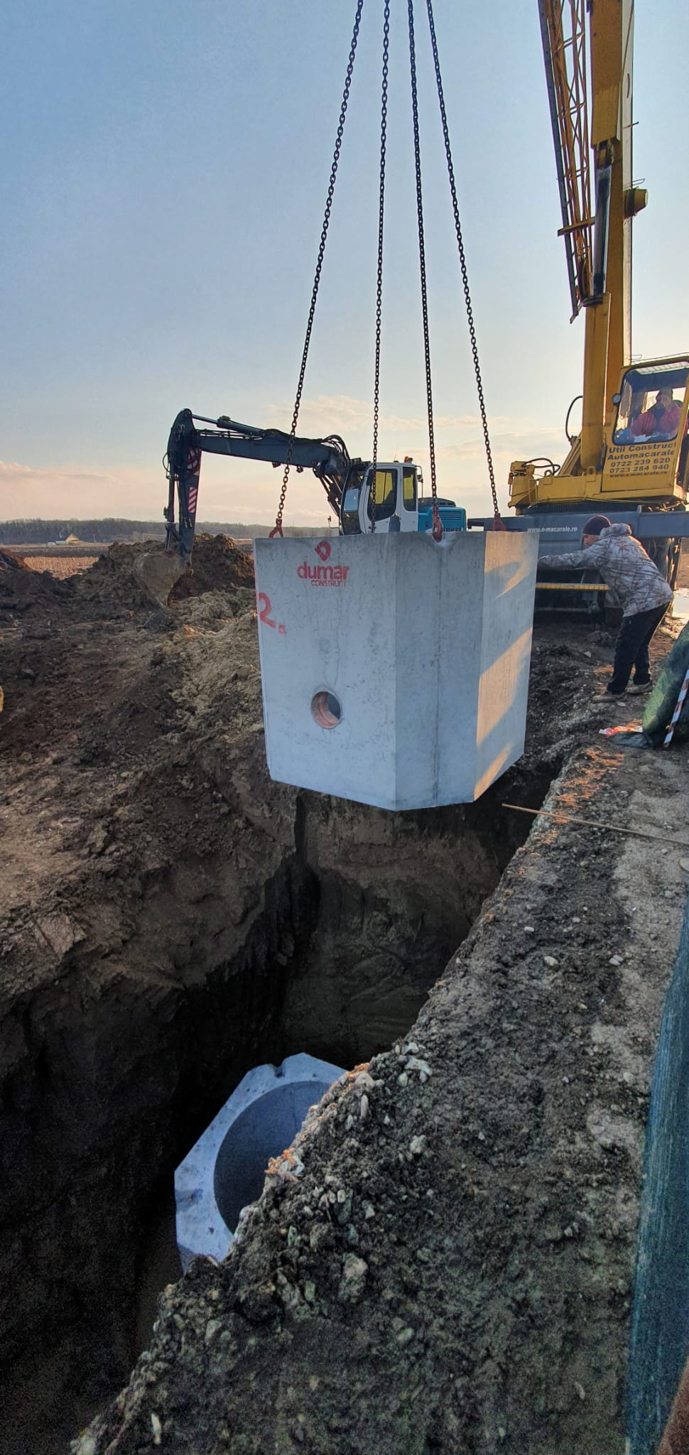 Coborâre cămin beton cu macaraua